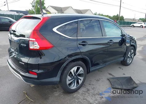 2015 Honda Cr-V Touring z USA, uszkodzony, nr VIN 5J6RM4H91FL110238